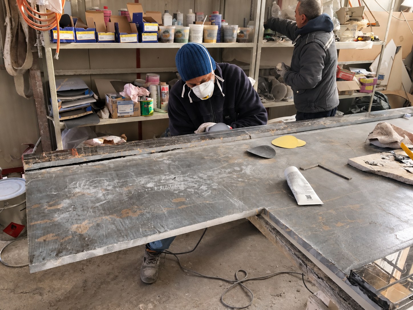 Stone artisans at the fabrication workbench.