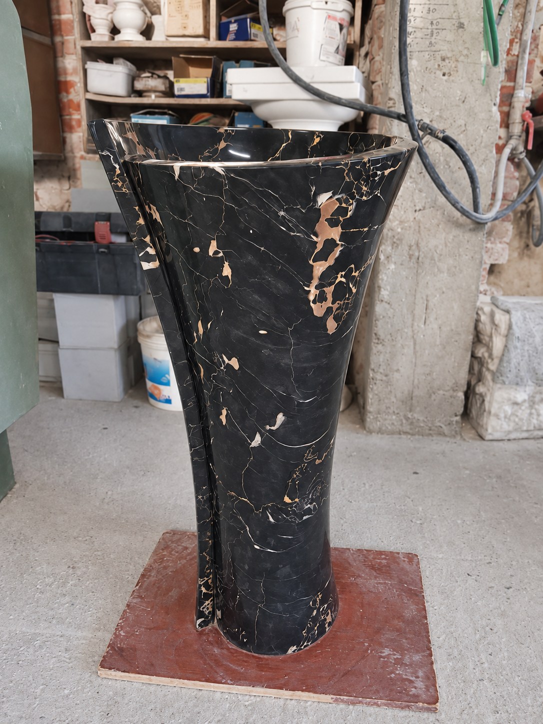 Sculptural Portoro basin in the stone workshop.
