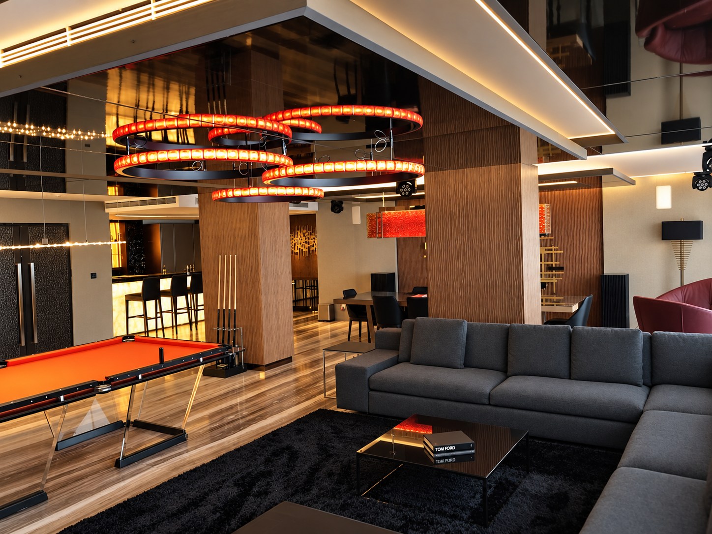 Sikder Haus: connected living, billiard, dining and bar spaces. Editorially styled photograph.